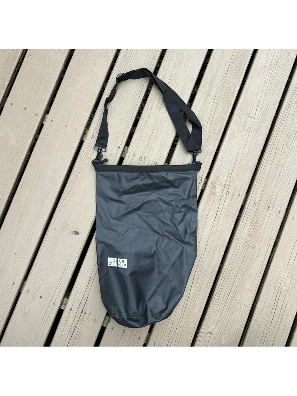 Uniqlo Dry Bag in Black with removable multi position adjustable strap